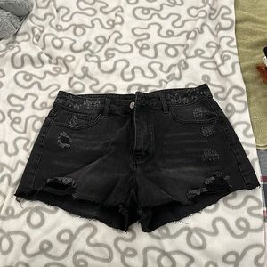I am selling these black jean shorts